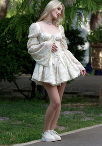 Blonde girl posing outdoors 1